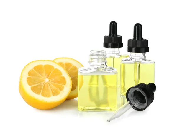 Frascos de perfume y limón — Foto de Stock