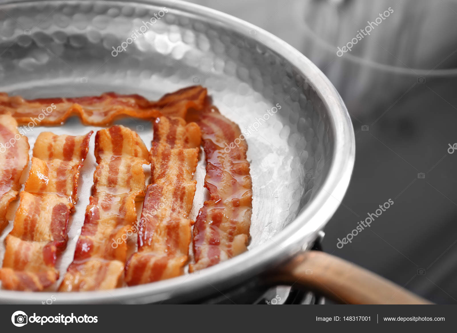 Strips of fried bacon Stock Photo by ©belchonock 148317001