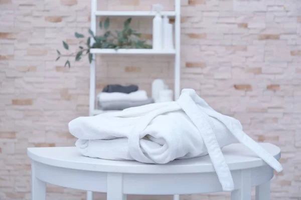 Folded spa bathrobe — Stock Photo, Image