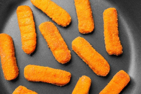 Pan with cheese sticks — Stock Photo, Image