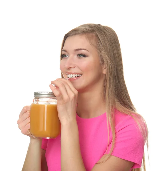 Beautiful young woman with glass of fresh juice on white background — Stock Photo, Image