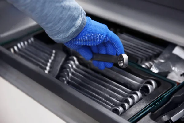 Male hand holding wrench — Stock Photo, Image