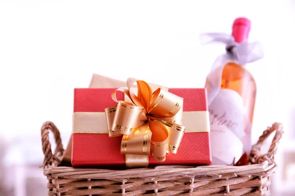 Wine bottle with gift boxes — Stock Photo, Image