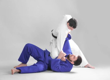 Men practicing martial arts clipart
