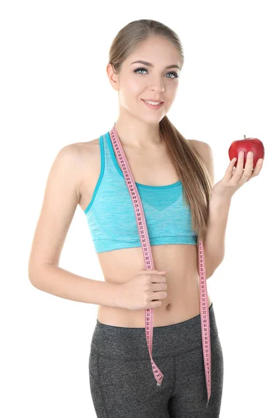 Mujer con manzana y cinta métrica — Foto de Stock