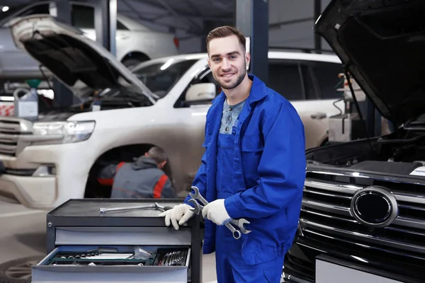 Young mechanic with tools — Stock Photo, Image