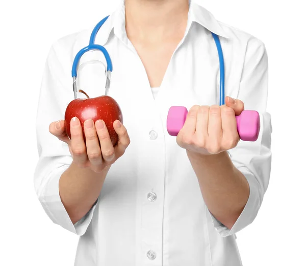 Voedingsdeskundige met appel en halter — Stockfoto