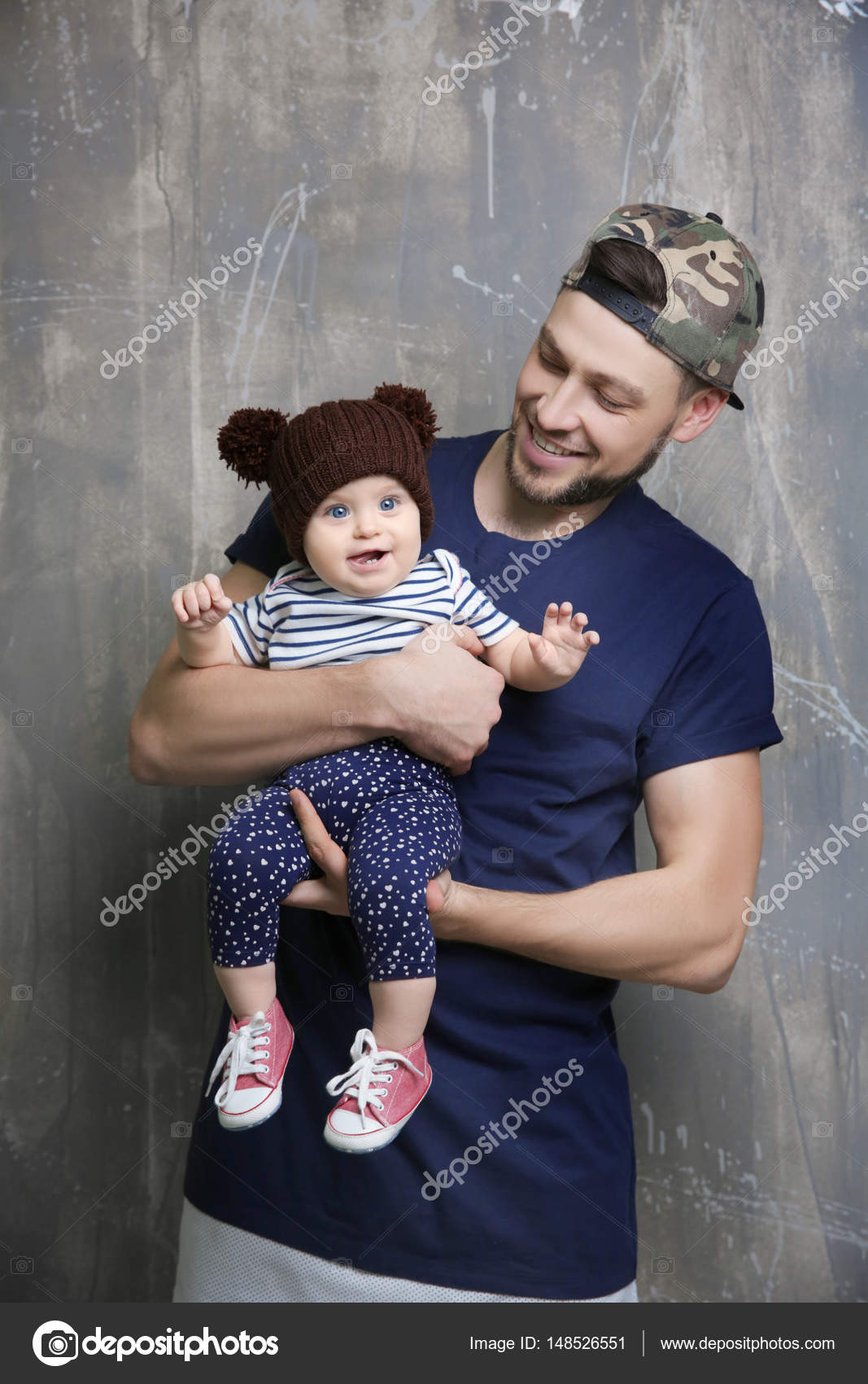 Happy father, little daughter and son smile and pose on ladder in studio,  Stock Photo, Picture And Low Budget Royalty Free Image. Pic. ESY-053495048  | agefotostock
