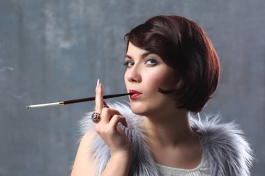 woman smoking with cigarette holder clipart