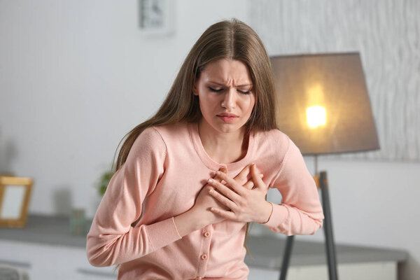 Girl having a heart attack at home