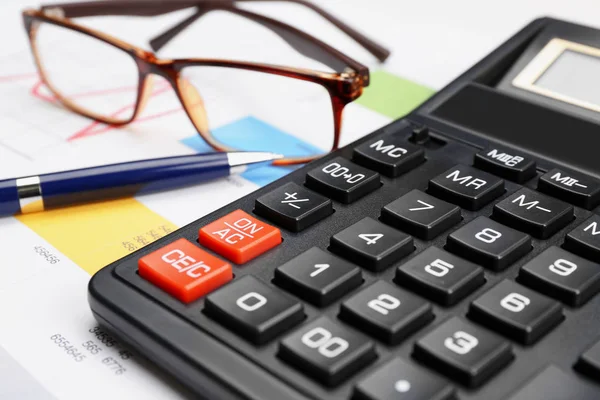 Calculator with tax documents — Stock Photo, Image