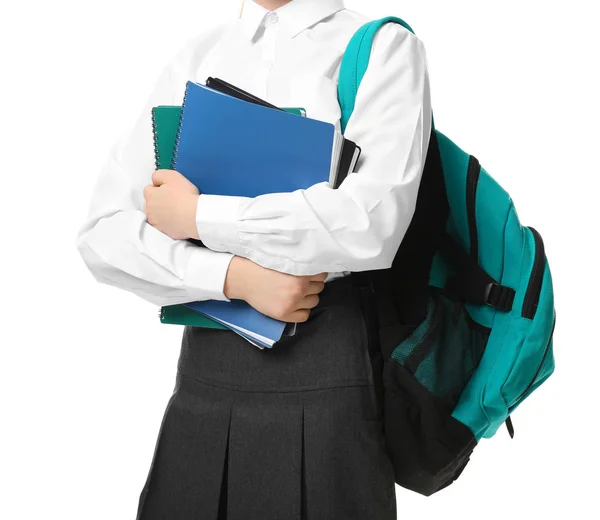 Menina bonito no uniforme da escola no fundo branco — Fotografia de Stock