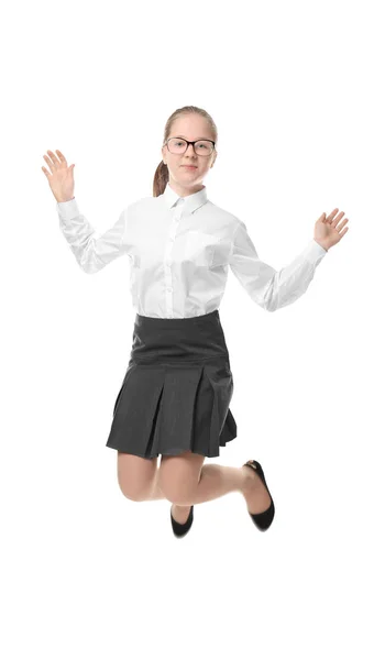 Schattig meisje in school uniform op witte achtergrond — Stockfoto