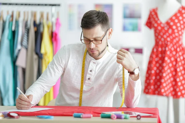 Young male fashion designer at workplace — Stock Photo, Image