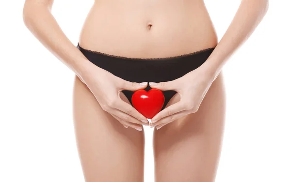 Young woman with red heart — Stock Photo, Image