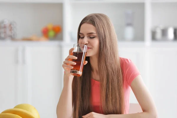 Woman tasting fresh juice — Stock Photo, Image