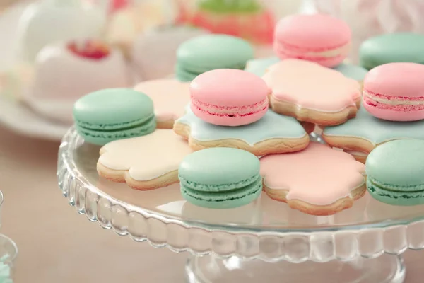Glass stand with tasty macarons — Stock Photo, Image
