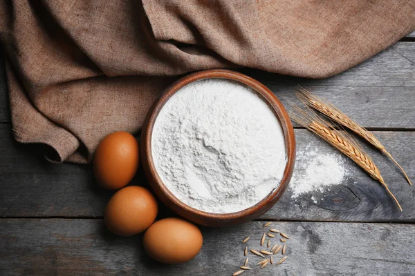 Bowl with flour and eggs — Stock Photo, Image