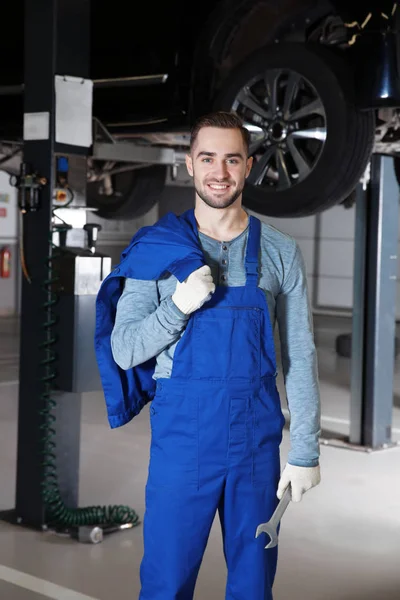 Young mechanic with tool — Stock Photo, Image