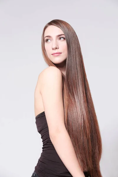 Donna con lunghi capelli lisci — Foto Stock