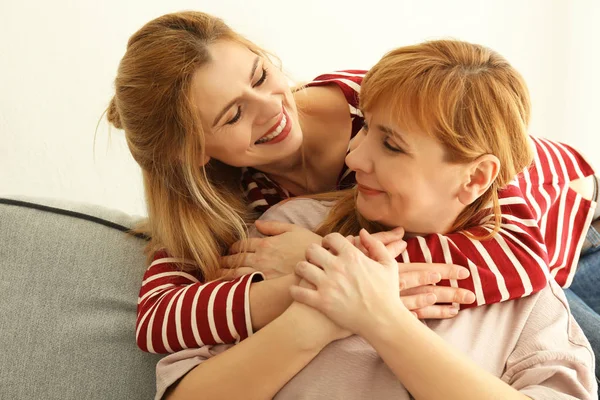 Happy young woman and mother — Stock Photo, Image