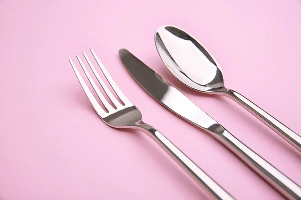 Cutlery set on color background — Stock Photo, Image