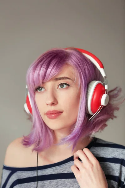 Beautiful young woman with dyed hair — Stock Photo, Image