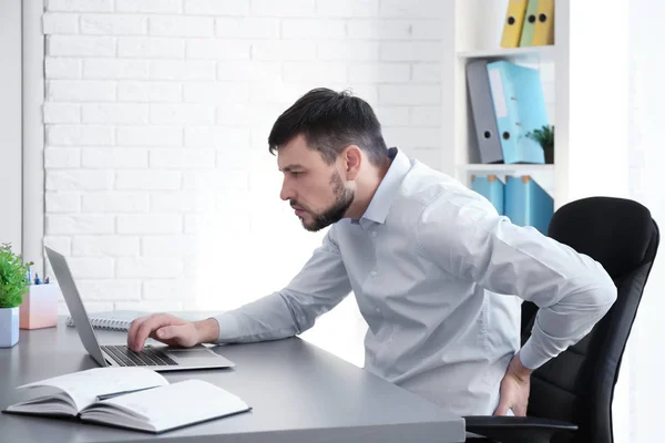Man suffering from back pain — Stock Image Man suffering from back pain Stock Image