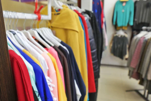 Rack with different clothes — Stock Photo, Image