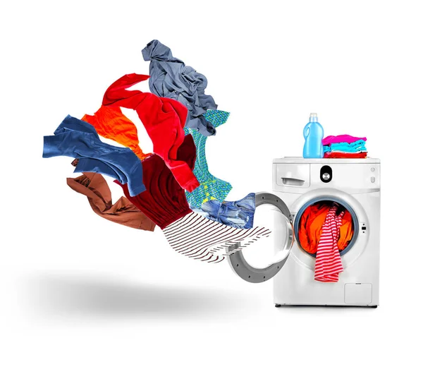 Washing machine and flying clothes — Stock Photo, Image