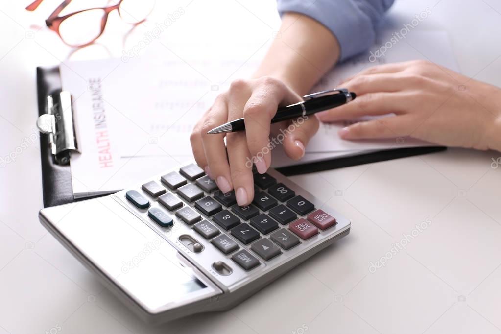 Insurance agent at workplace — Stock Photo © belchonock #148800921