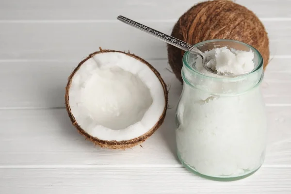 Spoon with fresh coconut oil — Stock Photo, Image
