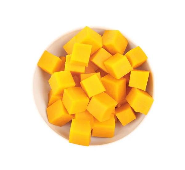 Delicious pieces of cheddar in bowl — Stock Photo, Image