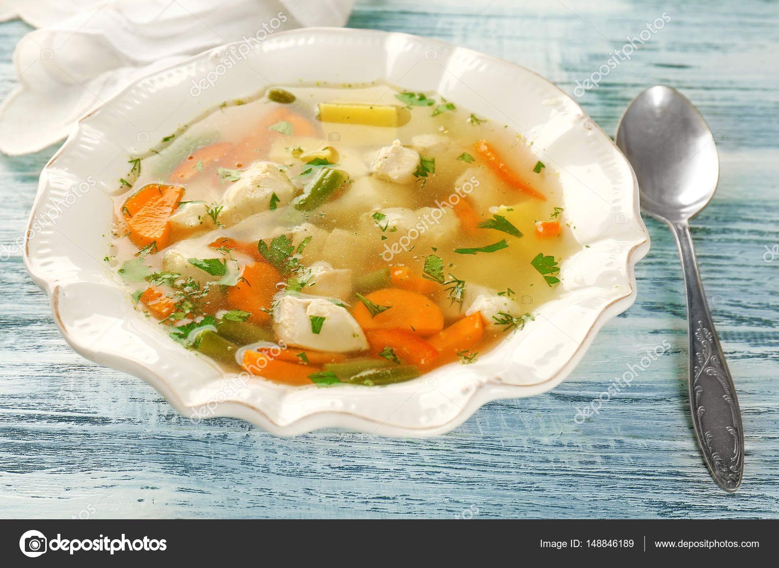Plate with chicken soup — Stock Photo © belchonock 148846189