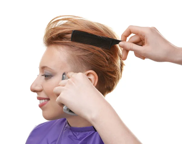 Peluquería trabajando con el cliente sobre fondo blanco — Foto de Stock