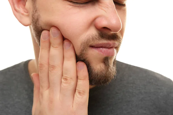 Homem bonito que sofre de dor de dente — Fotografia de Stock