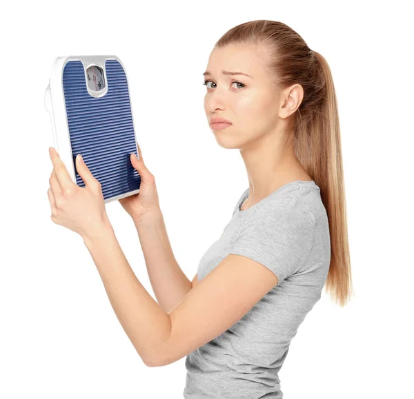 Young beautiful woman with scales — Stock Photo, Image