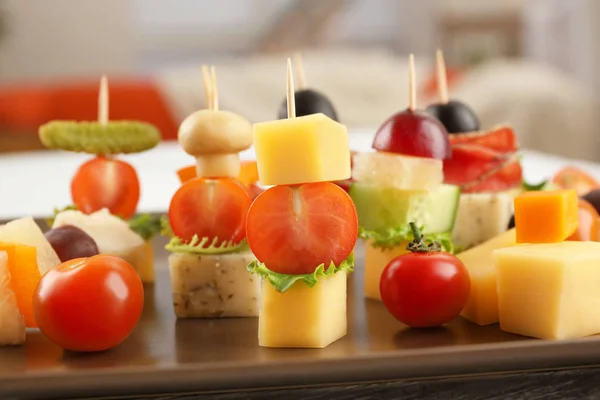 Brown plate with delicious canape — Stock Photo, Image