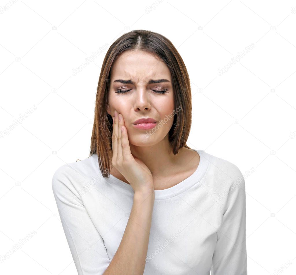 young woman suffering from toothache