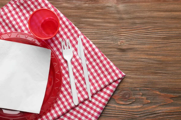 Red plastic disposable tableware — Stock Photo, Image