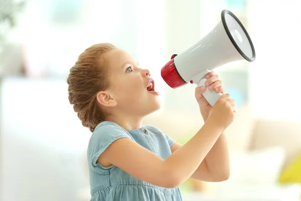 Little girl with megaphone — Stock Photo, Image