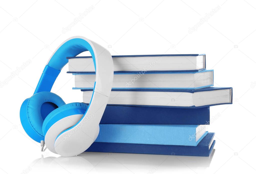 Stack of books and headphones