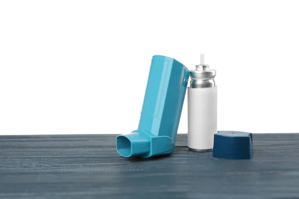 Asthma inhaler on table — Stock Photo, Image