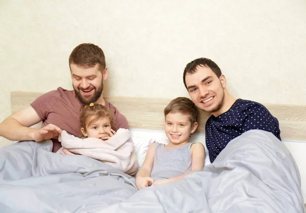 Male gay couple with children — Stock Photo, Image