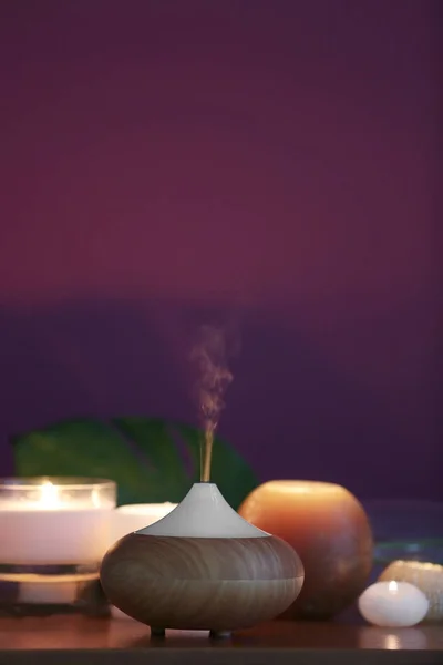 Aroma olie diffusor en kaarsen — Stockfoto