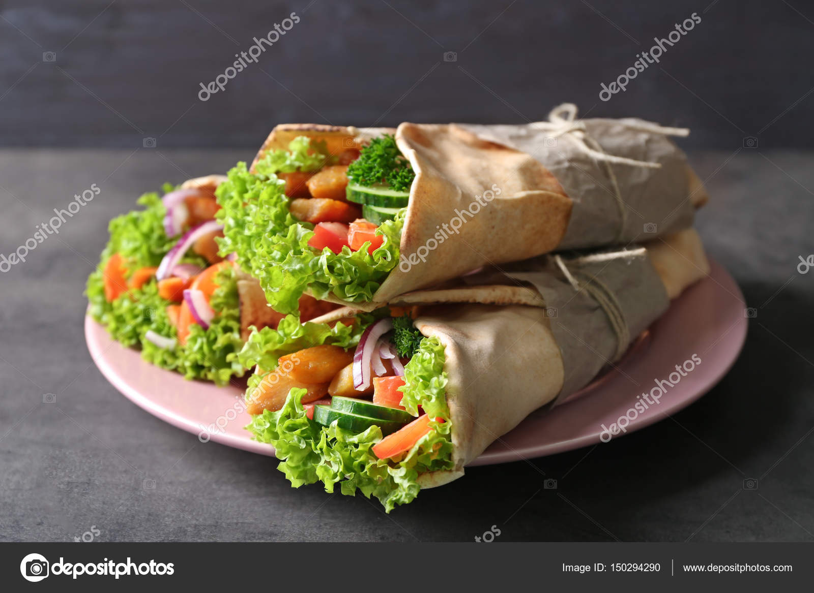 Plate with tasty kebab sandwiches — Stock Photo © belchonock #150294290