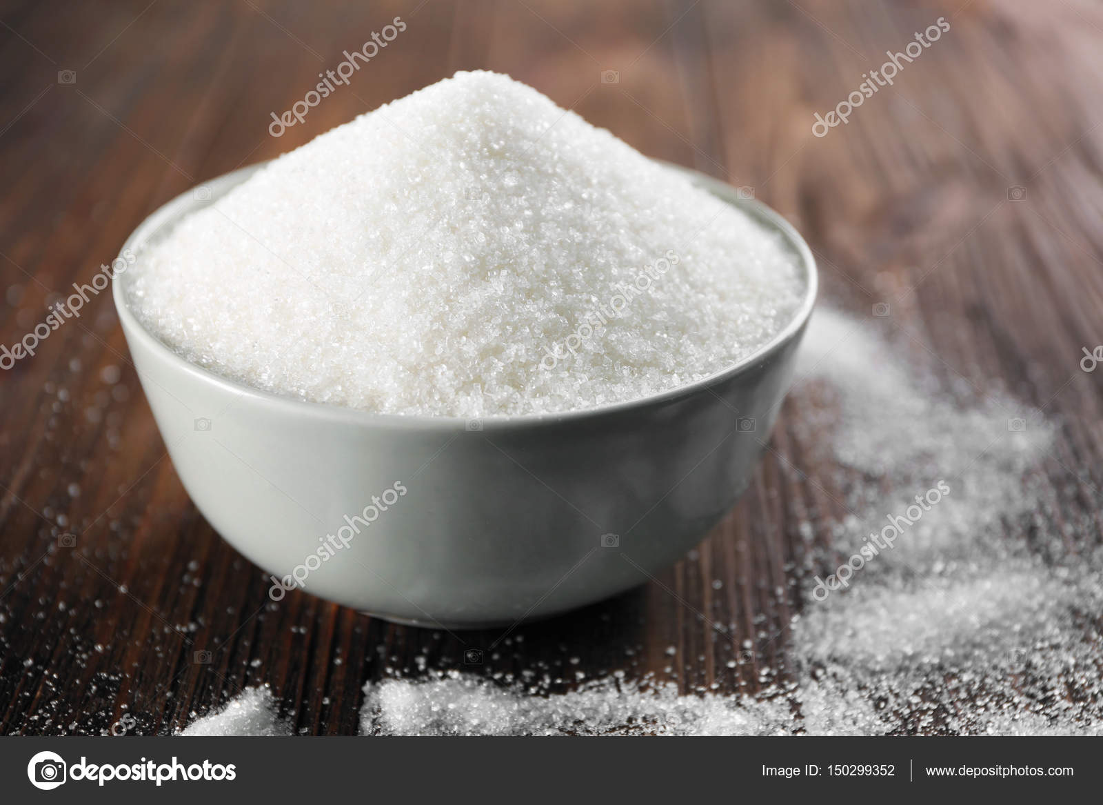 Bowl full of sugar — Stock Photo © belchonock 150299352