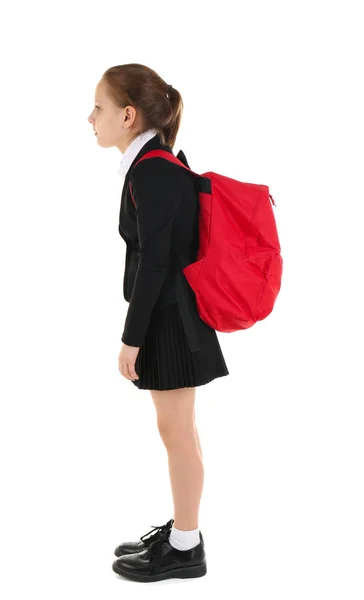 Cute schoolgirl with backpack on white background — Stock Photo, Image