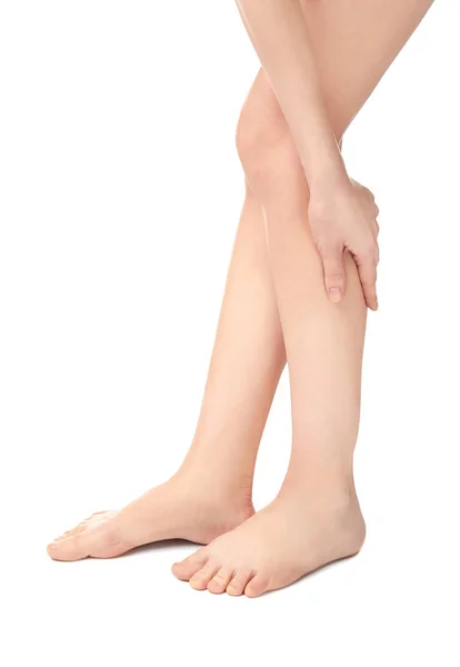 Vrouw die lijden aan pijn in de benen — Stockfoto