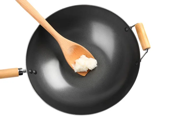 Espátula com óleo de coco em wok — Fotografia de Stock